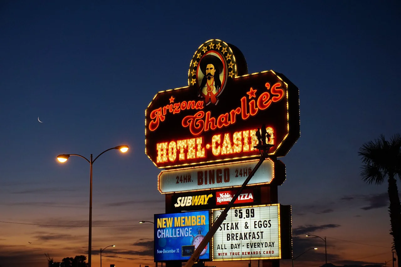 Arizona Charlie's Decatur neon marquee sign at dusk