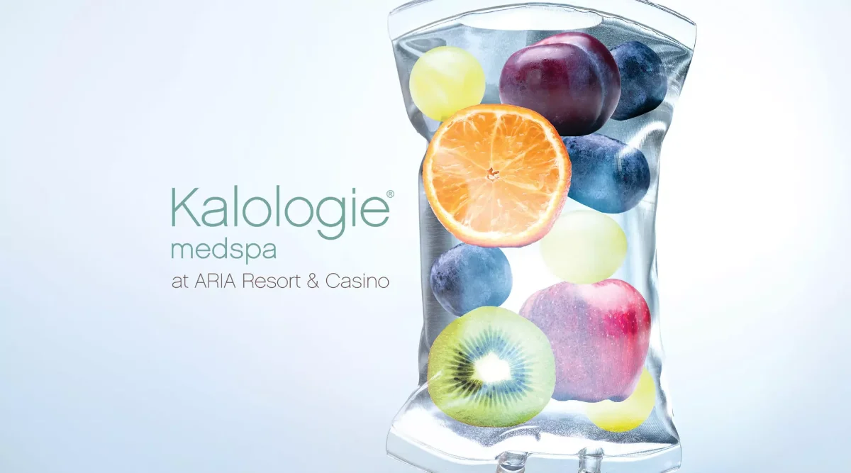Kalologie medspa at ARIA Resort & Casino branded graphic of a clear IV drip bag filled with fresh orange, kiwi, plum, grapes and apple to illustrate vitamin infusion therapy