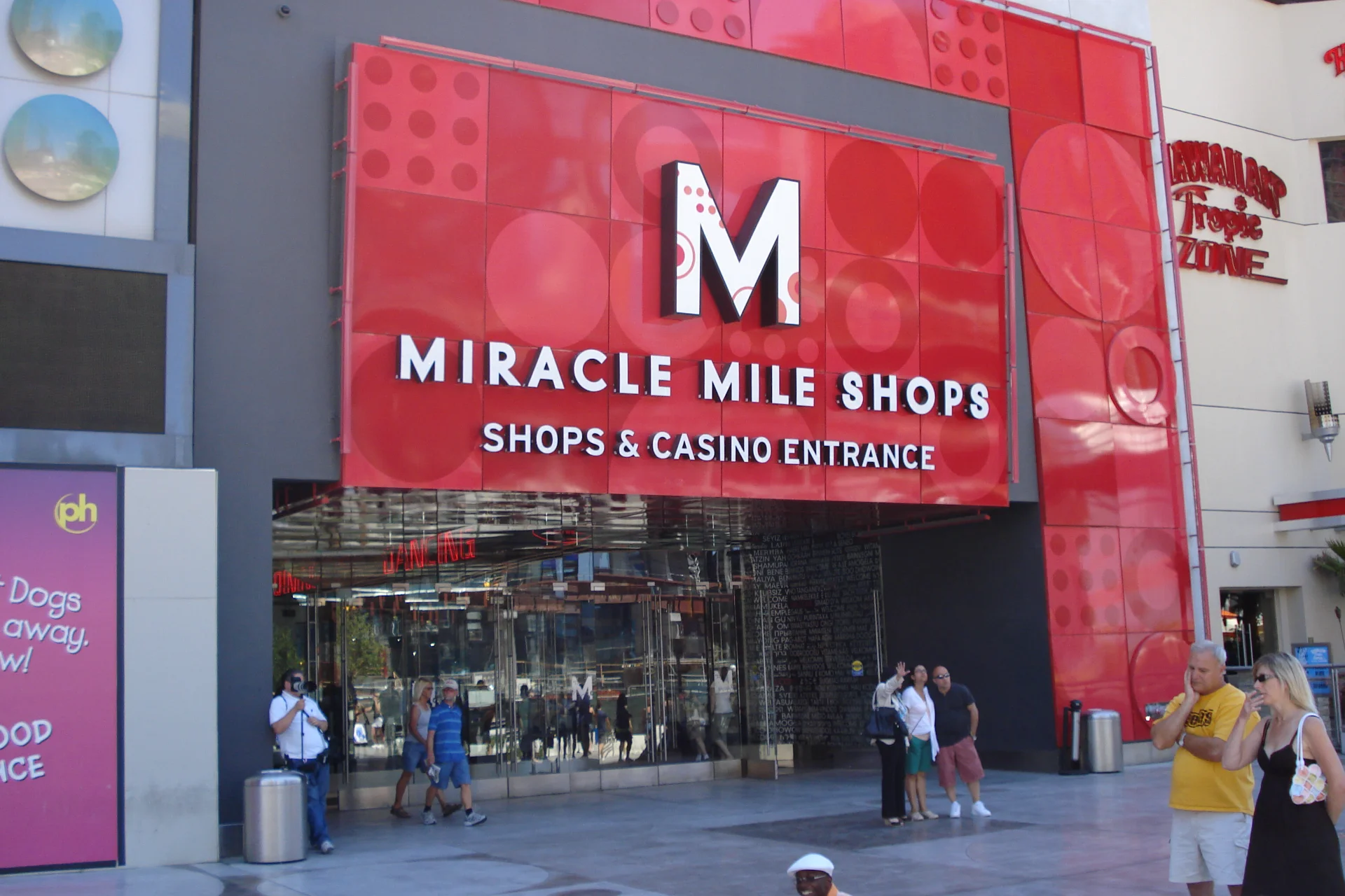 Red Miracle Mile Shops entrance sign marking the shops and casino entrance at Planet Hollywood on the Las Vegas Strip