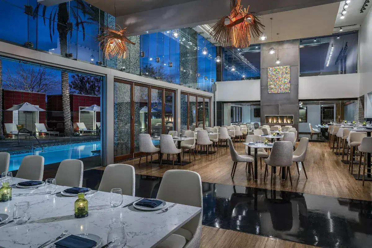 Modern poolside restaurant dining room at the Palms