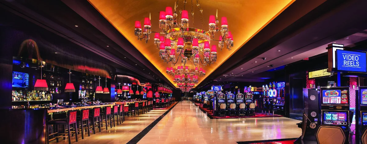 Casino floor with signature pink chandelier at The Cromwell