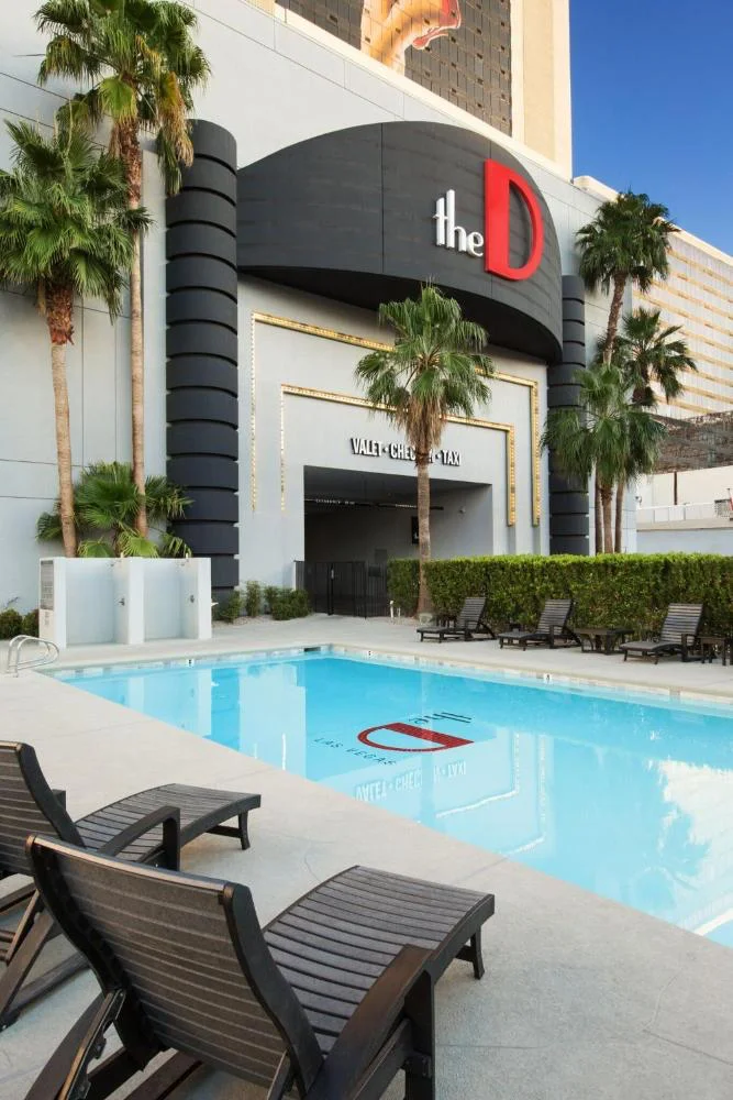 Poolside lounge chairs at The D entrance