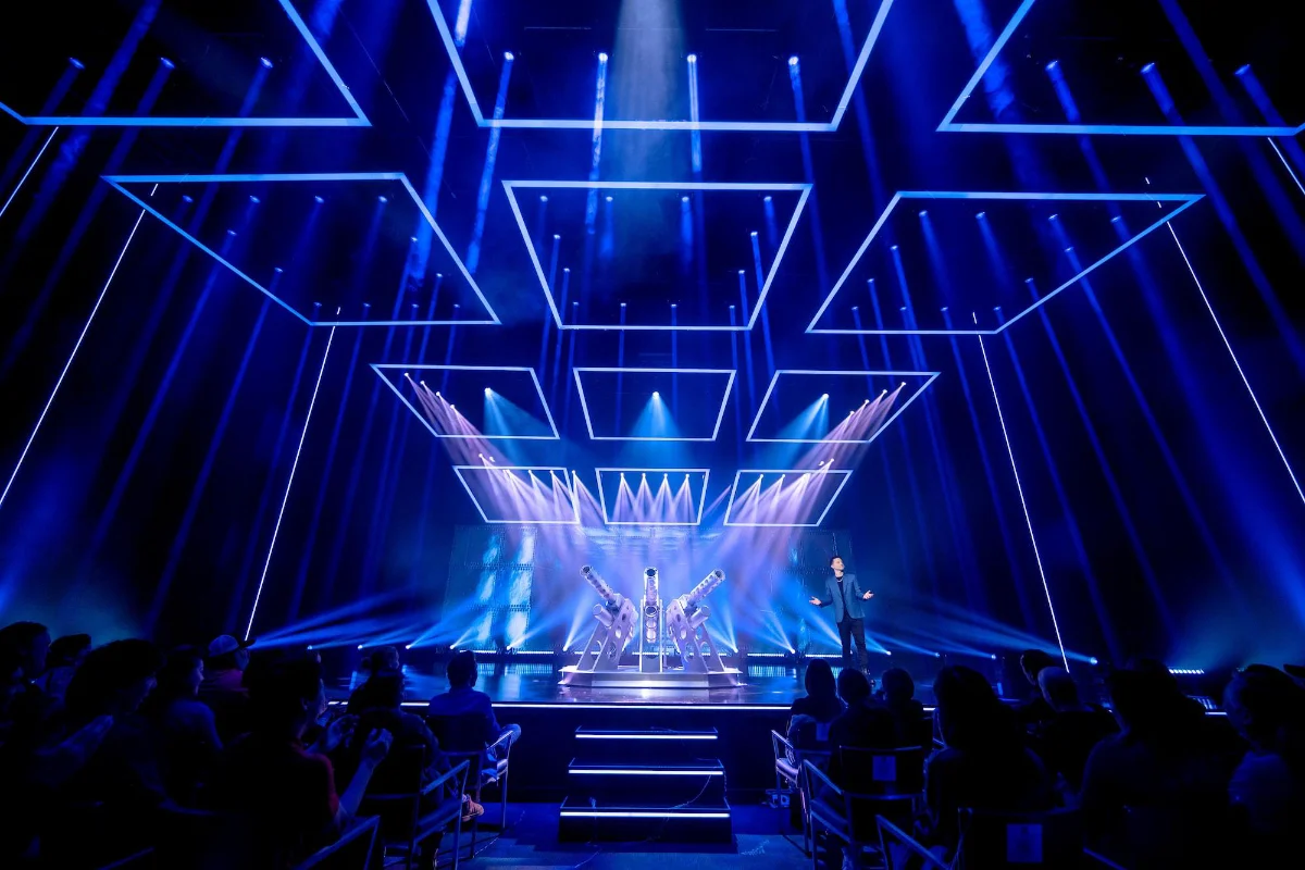 Live show with blue laser stage lighting at The LINQ theater