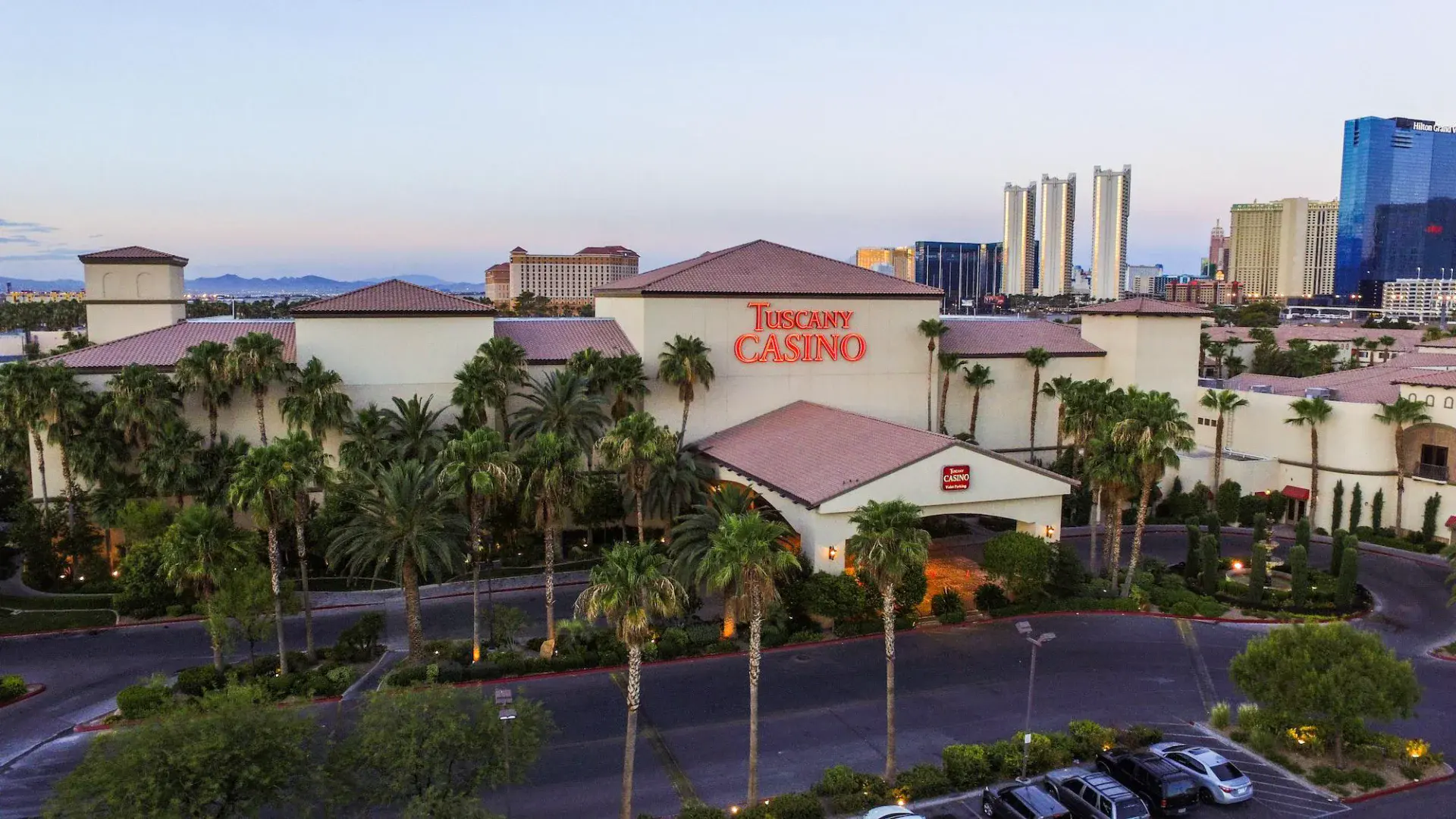 Tuscany Suites & Casino low-rise resort with the Strip skyline behind