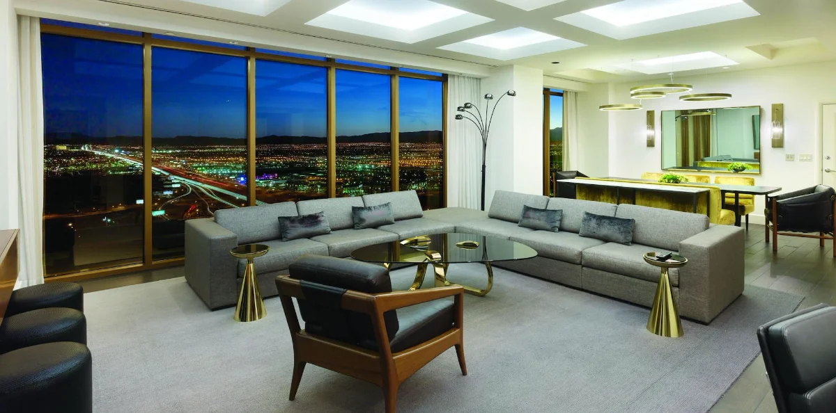Suite living room with panoramic Las Vegas valley views at W Las Vegas
