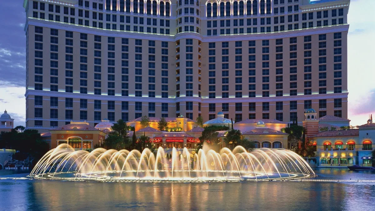 Bellagio fountain arcs at dusk